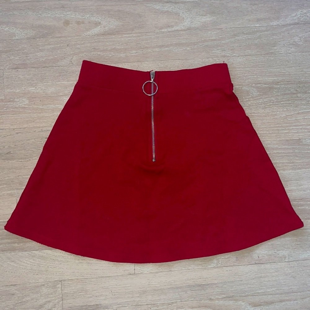 Red skater style skirt with functional zipper detail